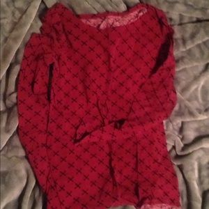 Purple long sleeve with cute black x's.